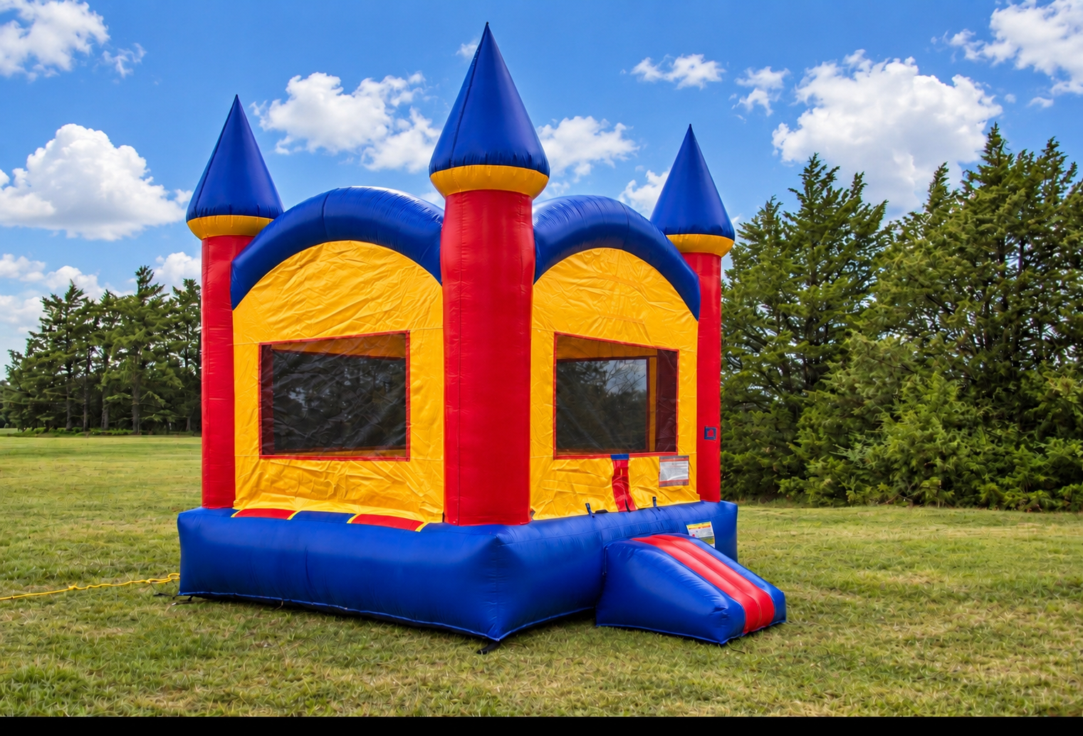 Our standard castle bounce house on grass